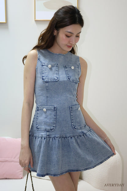 Arabelle denim pearl button pocket dress In Blue Wash