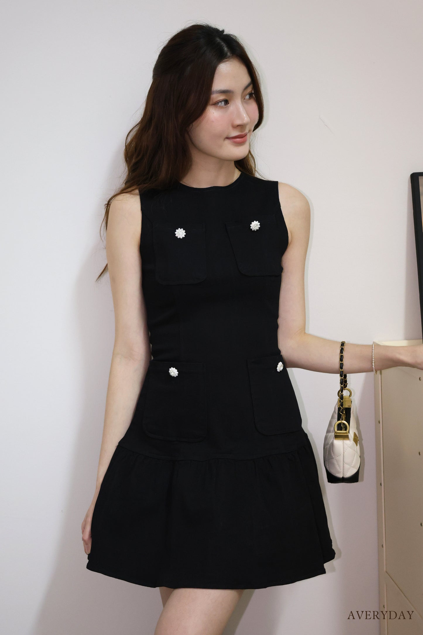 Arabelle denim pearl button pocket dress In Black