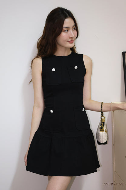 Arabelle denim pearl button pocket dress In Black