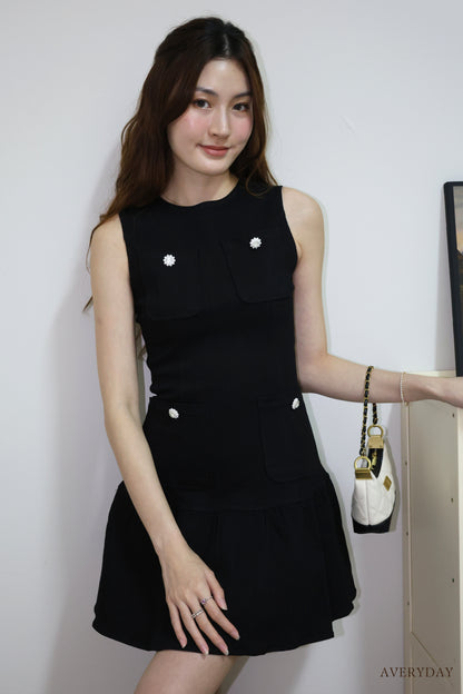 Arabelle denim pearl button pocket dress In Black