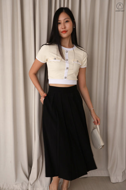 Sher Pleated Pocket Midi Skirt In Black