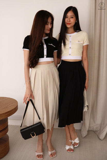 Sher Pleated Pocket Midi Skirt In Black