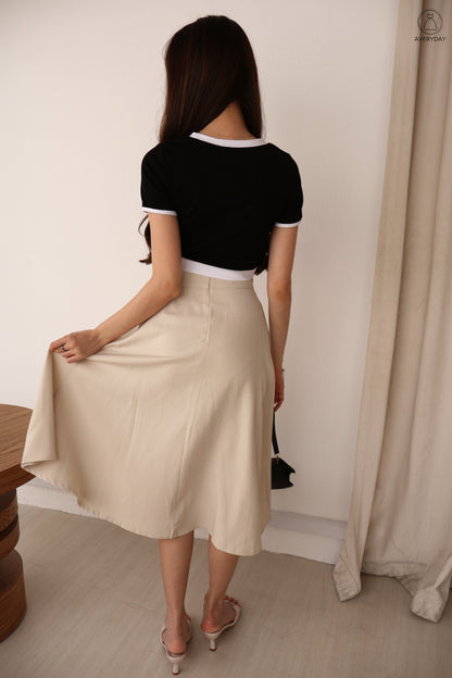 Sher Pleated Pocket Midi Skirt In Cream