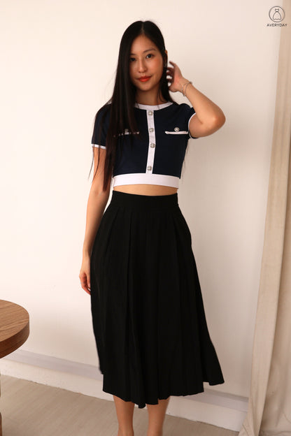 Sher Pleated Pocket Midi Skirt In Black