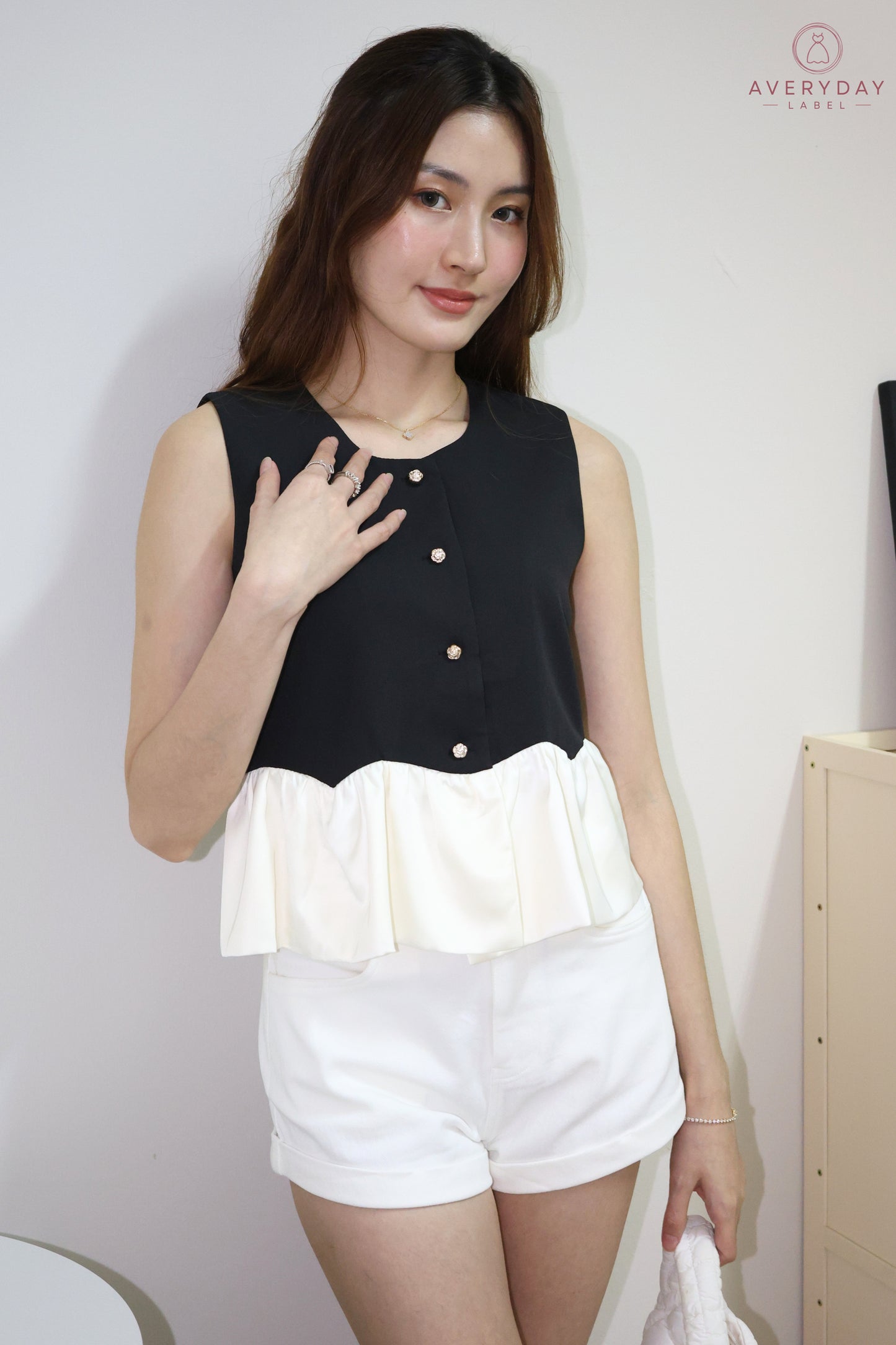 Landy Rose Button Peplum Top In Black