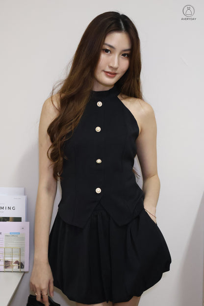 Axelle Pearl Button Halter Top In Black