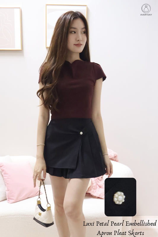 Luxi Petal Pearl Embellished Apron Pleat Skorts In Black