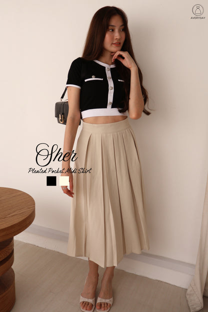 Sher Pleated Pocket Midi Skirt In Cream