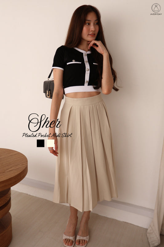 Sher Pleated Pocket Midi Skirt In Cream