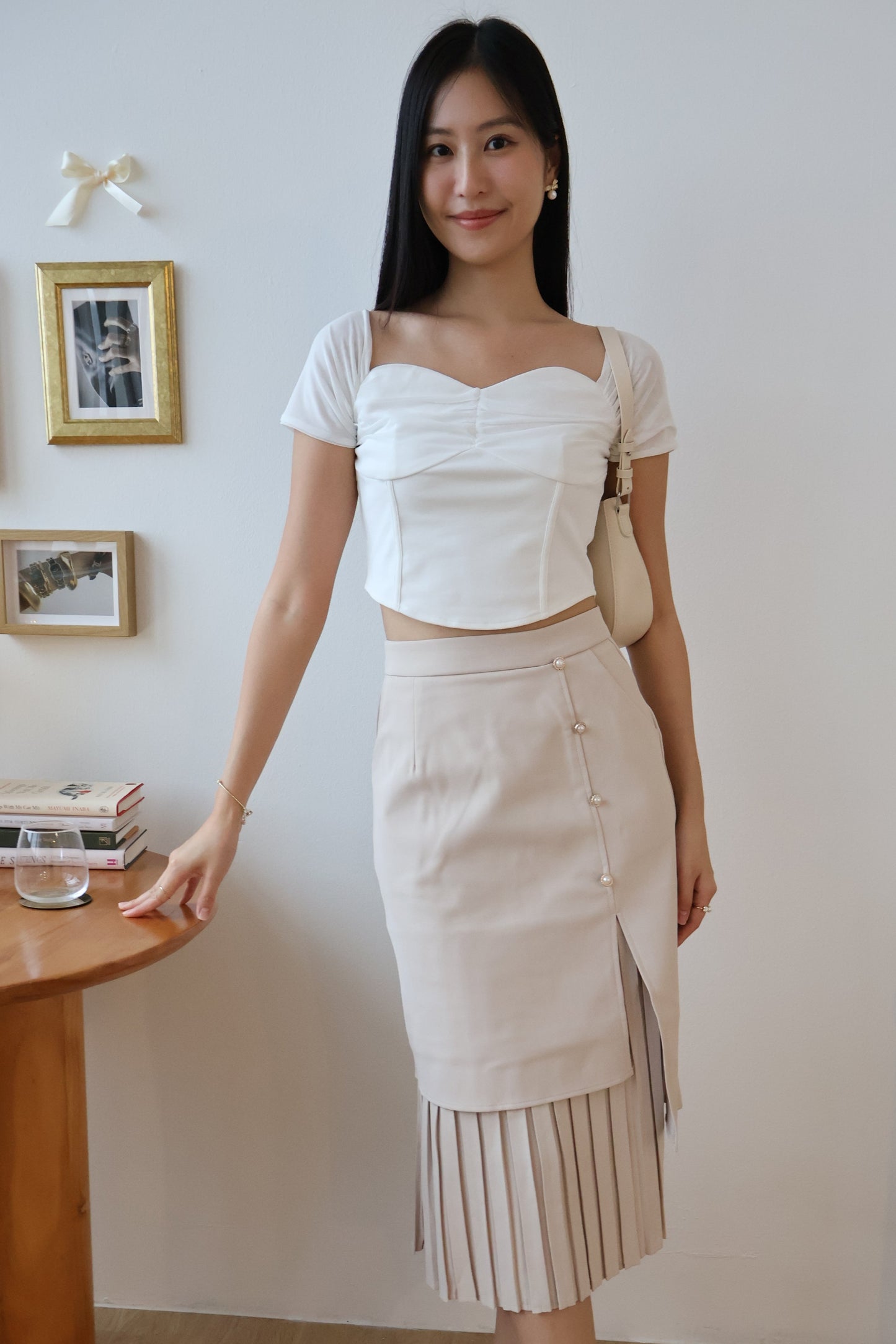 Rayne Pearl Button Pleated Skirt In Taupe