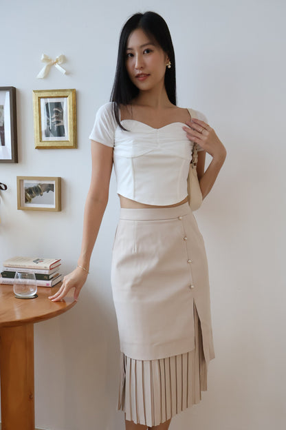 Rayne Pearl Button Pleated Skirt In Taupe