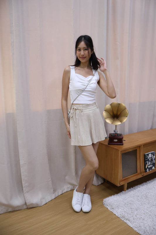 Emmy Ribbon Tie Pleated Skorts In Cream