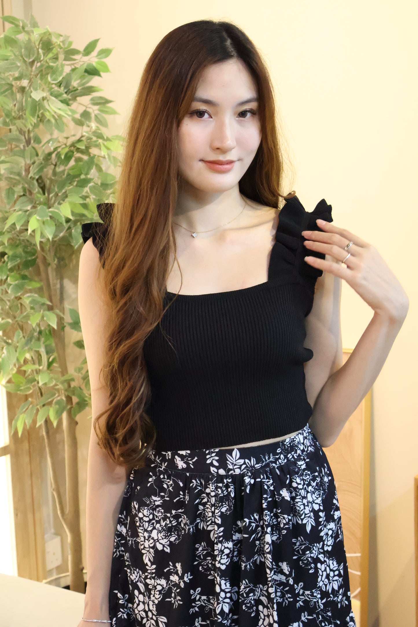 Myra Ruffles Ribbed Top In Black